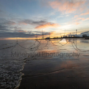 Sunrise Reflections on Minehead Beach